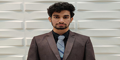 A picture of Mustafah Qureshi, the third individual on the contact us page.